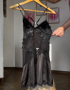 Black lace slip dress with criss cross back