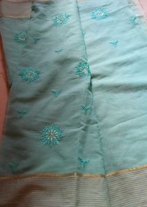 Beautiful Teal Saree with Intricate Embroidery
