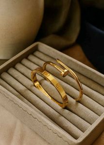 Elegant Gold Nail &amp; cartier Bracelet Set
