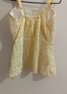 Sleeveless Peplum Top