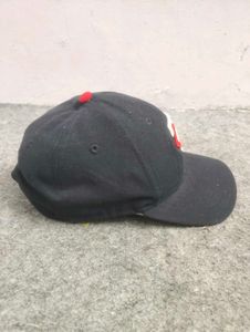 New Era Black Baseball Cap with T.C. Logo