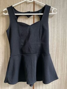 Chic Black Peplum Top with Heart Cutout