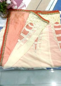 cream nd light orange saree with  Embroid