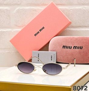 Miu Mi Oval Sunglasses