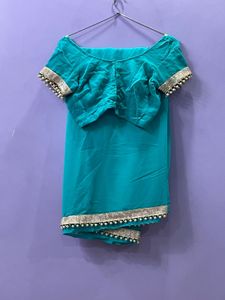 Teal Saree with Pearl Detailing