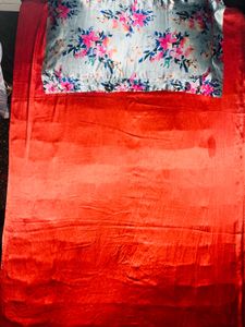 Satin bedcover with floral pillow