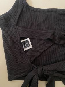 black backless top
