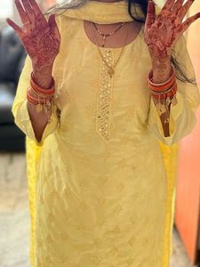Elegant Yellow Kurta Set with Intricate Detailing