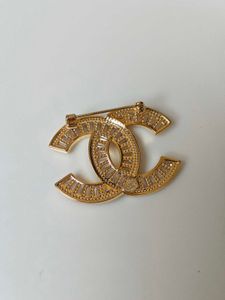 Elegant CC Brooch with Crystals