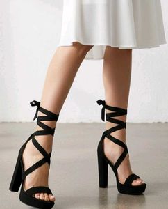 Black Platform Lace-Up Heels.