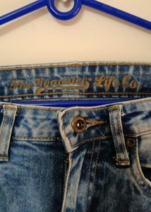 Women's Distressed Blue Jeans