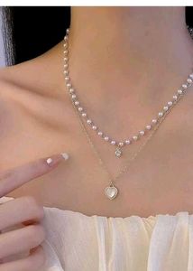 Layered Pearl Necklace with Heart Pendant