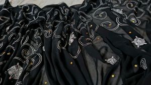 Price Drop. Elegant Black Saree with Sequin Swirl