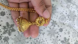 Elegant Gold Jhumka Earrings
