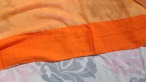 Orange Saree with Blue Velvet Blouse