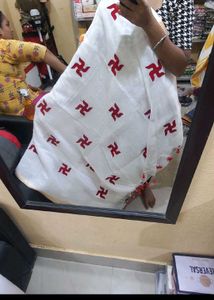 White saree with Red Swastik Print