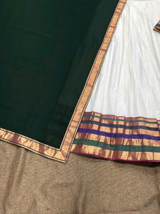 Elegant White Saree with Dark Green Border