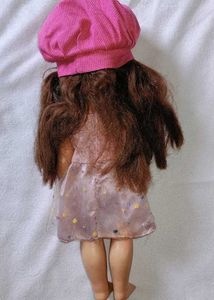 Vintage 1970s Doll with Pink Dress