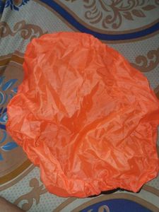 Bright Orange backpack rainy cover
