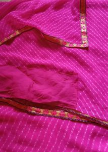 Vibrant Pink Saree with Floral Border