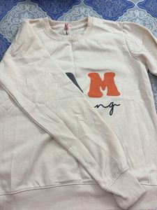 Cream Sweatshirt "I Am Evolving"