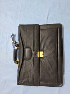 BRAND NEW LEATHER BRIEFCASE