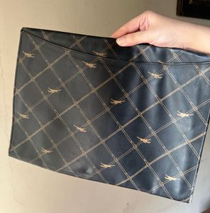 vintage Longchamp Monogram clutch