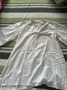 Elegant White Kurta Set with Intricate Detailing