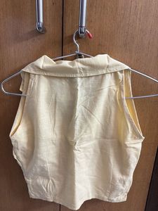 Pale Yellow Sleeveless Collared Top