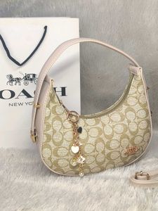 Coach Moon with charm& Carry bag
