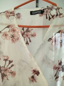 Wrap dress, with floral detailing