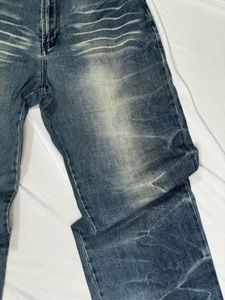 Distressed Blue Denim Jeans