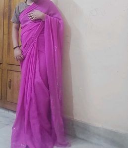 Vibrant Pink Saree with Subtle Embellishments