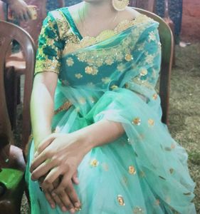 Sea Green Net embellished Saree