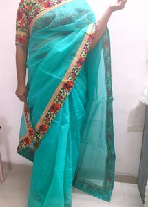 Beautiful Teal Saree with Floral Border