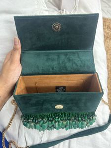 Elegant Green Suede Bag with Bamboo Handle