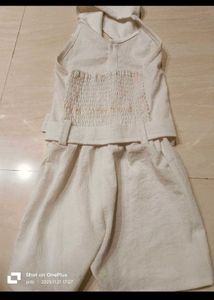 Chic Off-White Jumpsuit with Belt