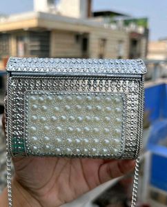 Elegant Pearl Embellished Clutch from Snatcher