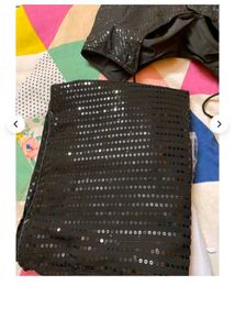 Black Saree With Padded Sleevless Blouse.