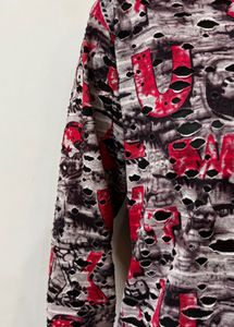 Graphic Print Distressed Long Sleeve Top