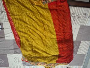 Yellow & Red Saree with Embossed Pattern