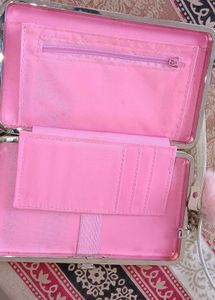 Quilted Pink Clutch with Pom Po