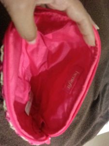 Pink benefit makeup or travel pouch