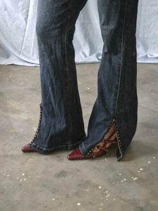 Flared Jeans with Studded Slits