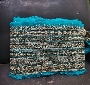 Elegant Teal Sequined Fabric