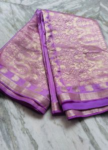 lavender colour saree with elegant contrast matchi