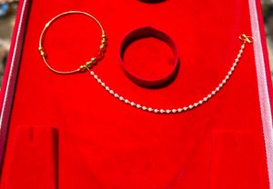Elegant Gold and Pearl Nose Chain