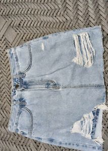 Light Wash Distressed Denim Skirt