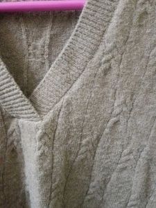 Knitted beige vest