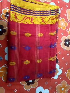 Vibrant Red Saree with Floral Motifs